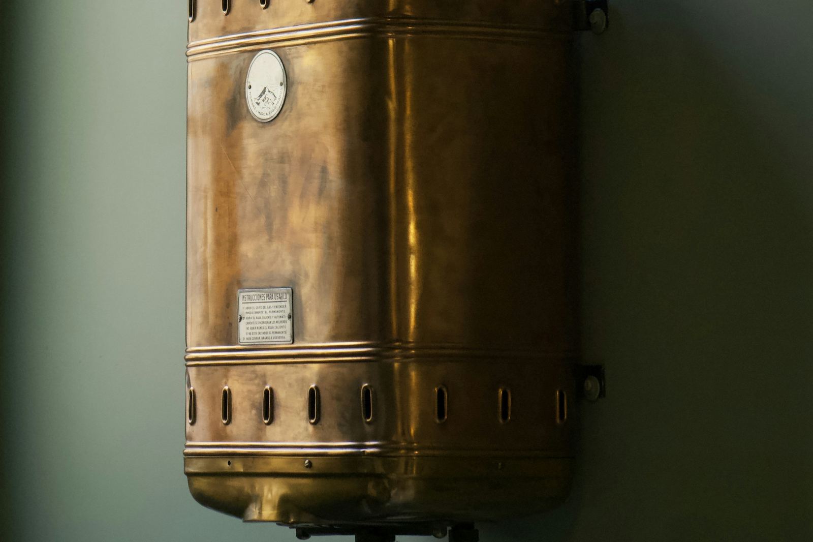 A wall-mounted tankless water heater